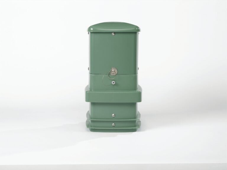Green telecommunications cable pedestal.