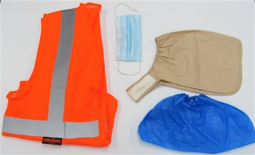 Variety of safety products including an orange safety vest, mask and shoe covers.